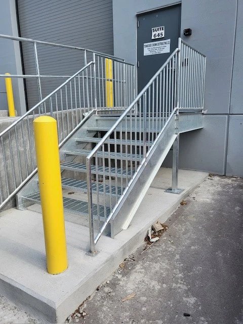 AEI metal stair with grating treads
