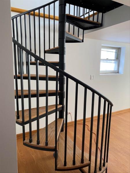Installation example of Lamonaca Iron Works interior spiral stairs for residences