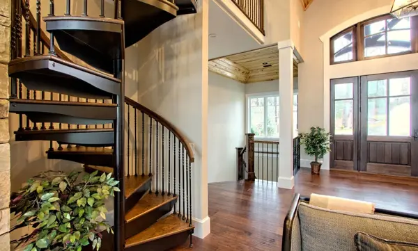 Modern indoor spiral stairs installed in a living room