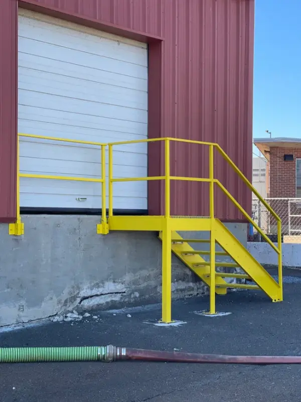 A vivid yellow steel staircase